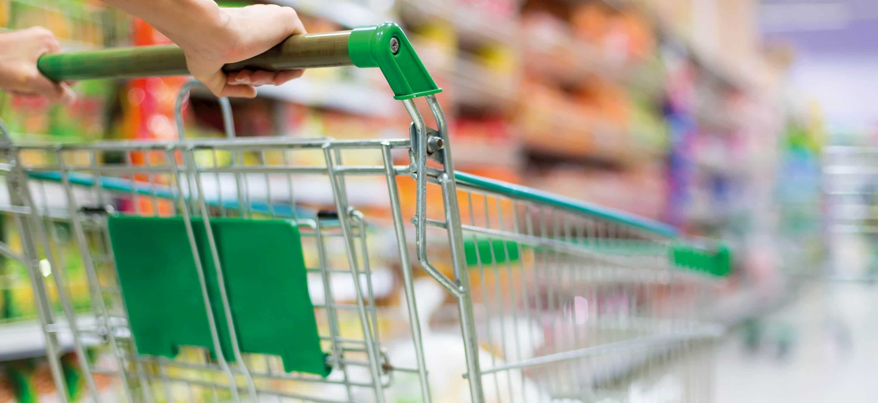 Shopping trolleys in the supermarket as a symbol for retail logistics